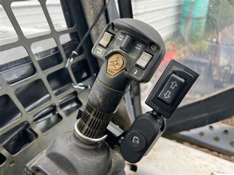 skid steer soil coditioner electric control toggle switch|bobcat attachment dual switch control.